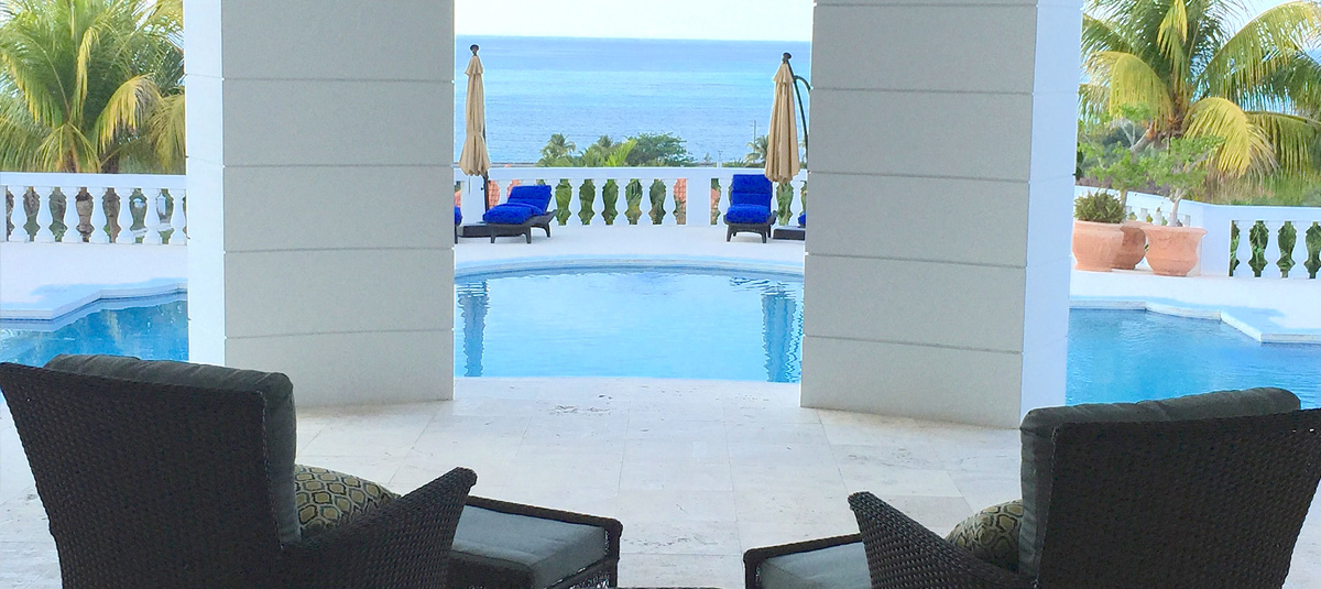 Ocean West colonnade opening onto the pool and ocean